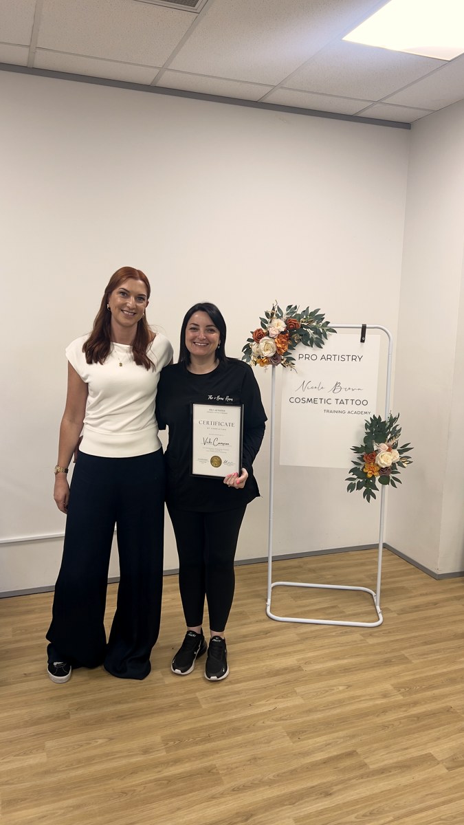 Vicki Campion receiving Pro Artistry cosmetic tattoo training certificate